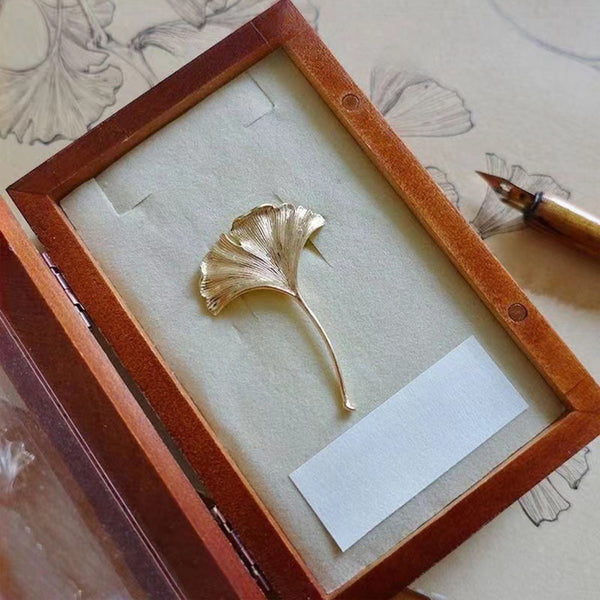 Shiny gold ginkgo leaf brooch