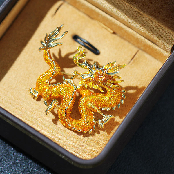 Flying golden dragon brooch