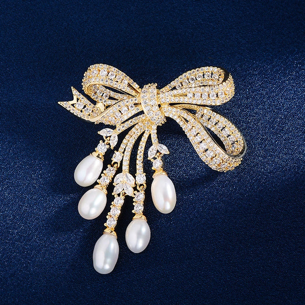 Zirconium-inlaid bow pearl brooch